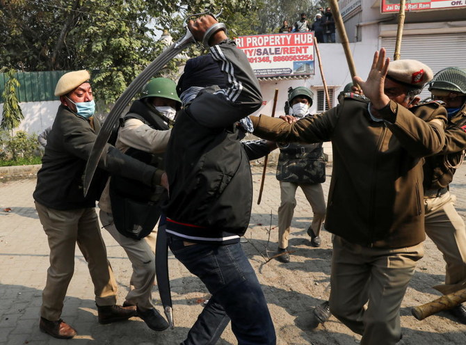 Protesting Indian farmers begin hunger strike after week of clashes