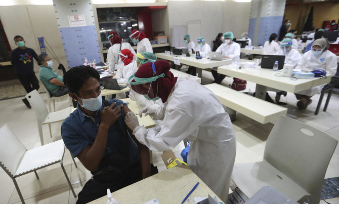 Indonesia capital warns of big fines for refusing COVID-19 vaccine