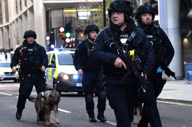 The man, LF, was an associate of one of the men who killed eight people in an attack on London Bridge in June 2018, police officers involved in that incident seen here. (AFP/File Photo)