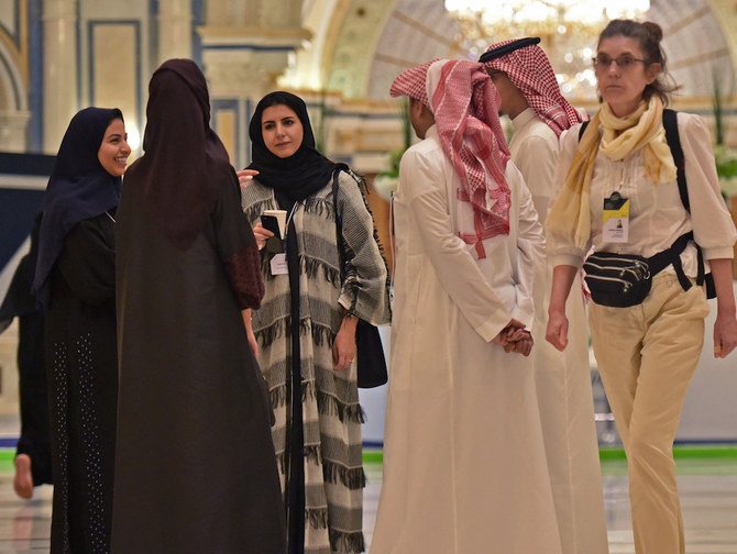 The Saudi government is working directly with companies like Serco to hire more local staff and promote equal opportunities for women in the Kingdom. (AFP/File Photo)