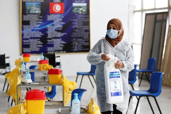 A Tunisian health worker prepares to receive people for a vaccination against the coronavirus disease (COVID-19), in Tunis, Tunisia March 13, 2021. (Reuters/File Photo)