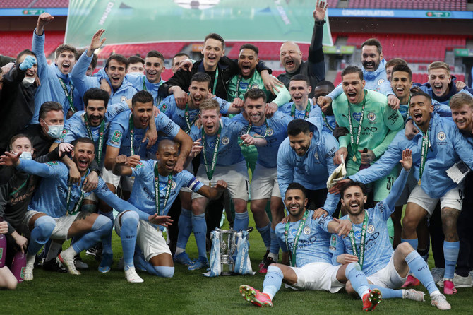 Man City outclass Tottenham to retain League Cup in front of 8,000 fans