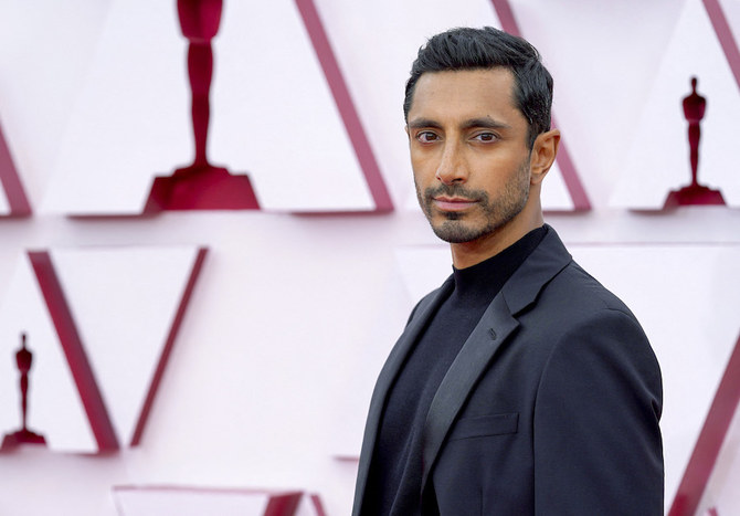Svelte tailoring, standout colors dominate men’s fashion on the Oscars red carpet