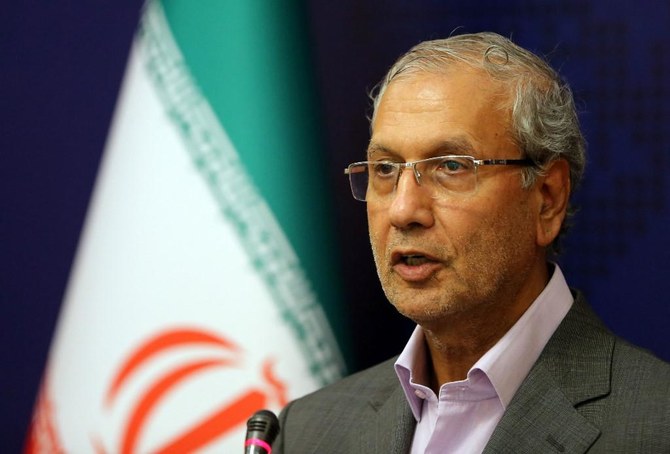 Iran bans 15 from traveling as official resigns