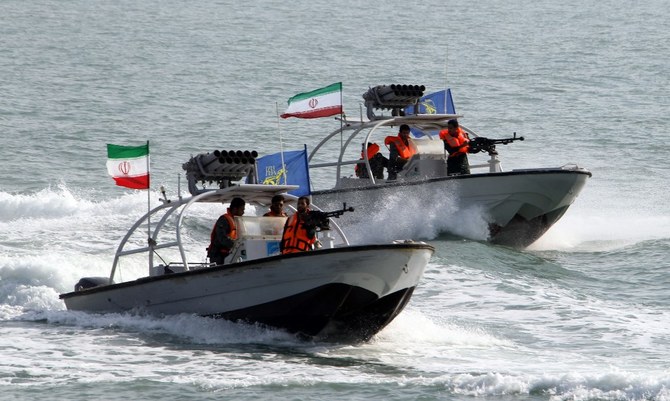 US ship fires warning shots in encounter with Iranian boats