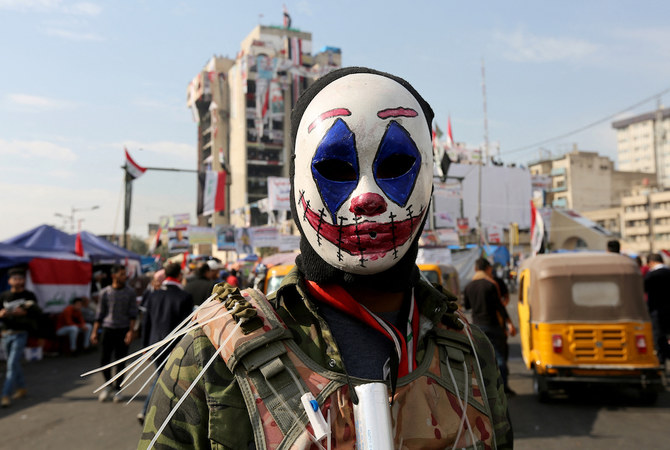 An Iraqi protester wearing the DC comic Joker character's mask poses for a picture during an anti-government demonstration in the capital Baghdad, November 23, 2019. (AFP/File Photo)