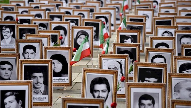 In 1988, thousands of PMOI supporters were summarily executed by Tehran, in a mass killing that the UN and rights groups have said constituted crimes against humanity. (People’s Mojahedin Organization of Iran/File Photo)