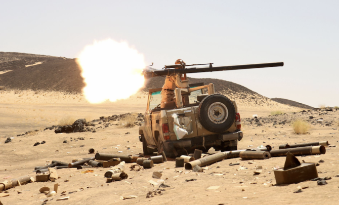 A Yemeni government fighter fires a vehicle-mounted weapon at a frontline position during fighting against Houthi fighters in Marib, Yemen March 9, 2021. (Reuters/File Photo)