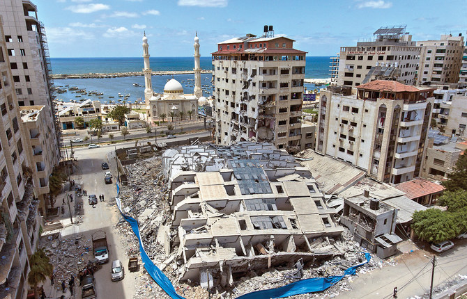 An aerial view of a destroyed building in Gaza City after it was hit last week by Israeli airstrikes. (AP)