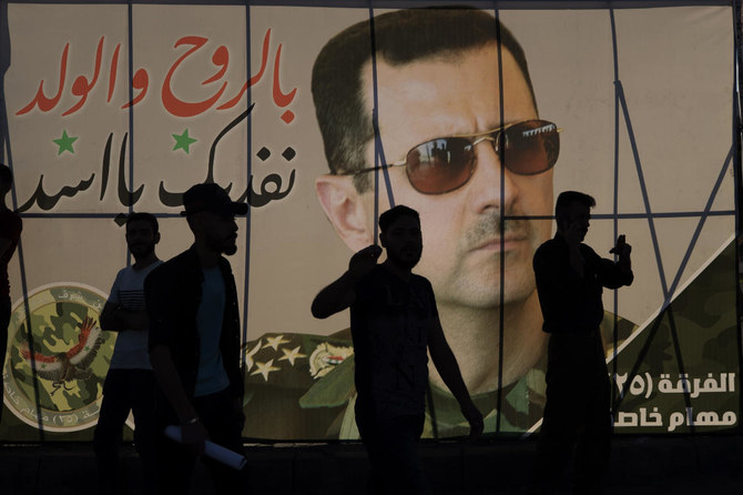 Syrians vote in election certain to give Assad new mandate