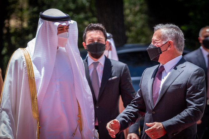 Jordan’s King Abdullah II receives Abu Dhabi Crown Prince Sheikh Mohammed bin Zayed at Marka airport in Amman on Thursday, May 27, 2021. (Twitter/@KingAbdullahII)