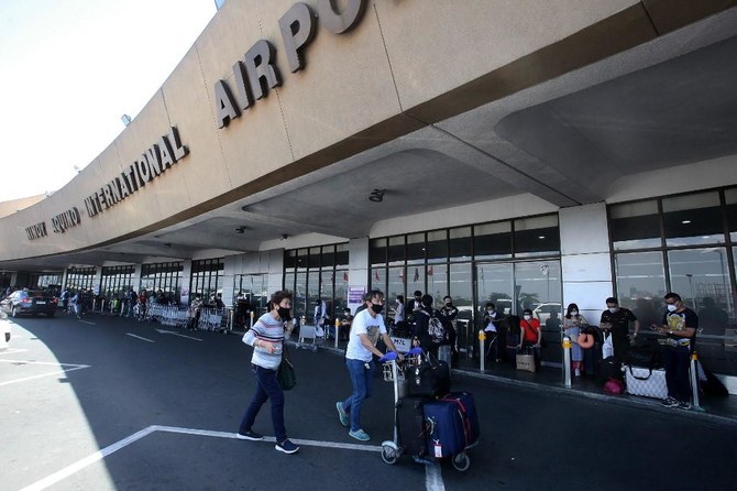 Philippines extends COVID-19 curbs in capital, ban on inbound travel from several countries