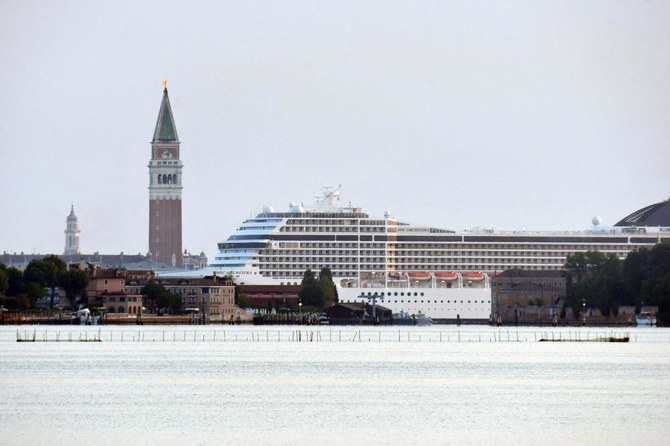 1st cruise ship sails through Venice since start of pandemic