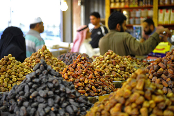 Saudis buy dates at a shop in Jeddah ahead of the Muslim holy fasting month of Ramadan. (AFP/File Photo)