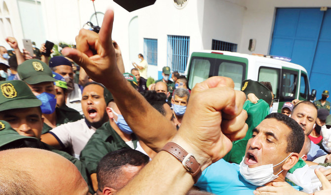 Two Algerian opposition figures held ahead of vote, capital sealed