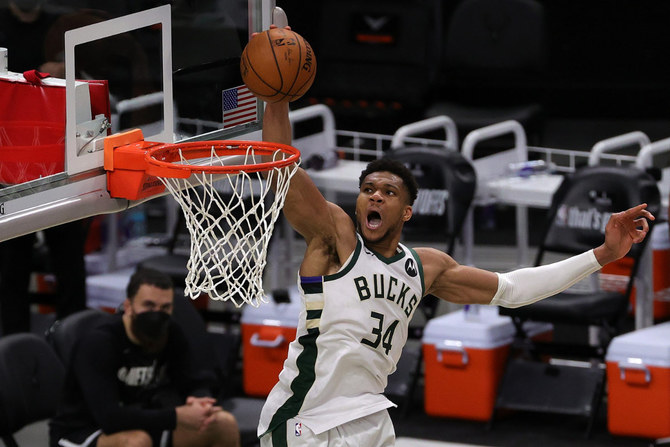 Giannis Antetokounmpo dunks during Game 4 of the Bucks-Nets second round playoff series on June 13, 2021 in Milwaukee, Wisconsin. (Stacy Revere/Getty Images/AFP)