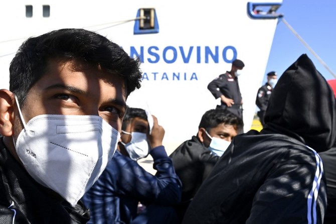 Nearly 1,300 migrants arrive on Italian island