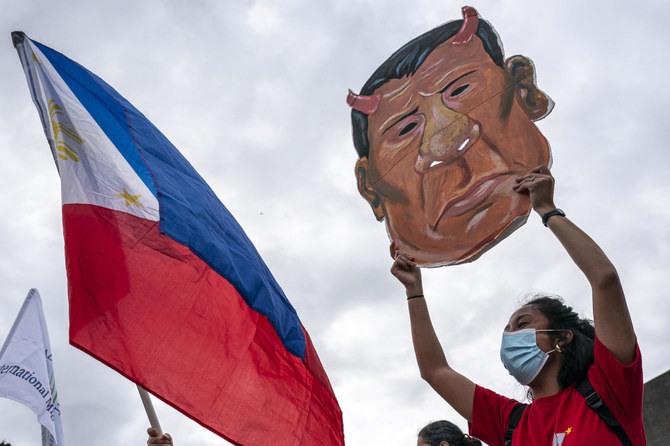 Protesters mark Philippine president’s last year in power