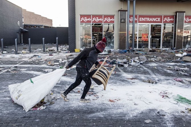 Stores and warehouses in South Africa were hit by looters on July 13, for a fifth day running despite the troops President Cyril Ramaphosa deployed to try to quell unrest that has claimed 72 lives. (AFP)