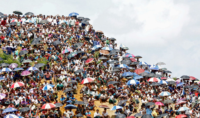 Rohingya refugees gather to mark the second anniversary of the exodus at the Kutupalong camp in Cox’s Bazar, Bangladesh, August 25, 2019. (REUTERS)