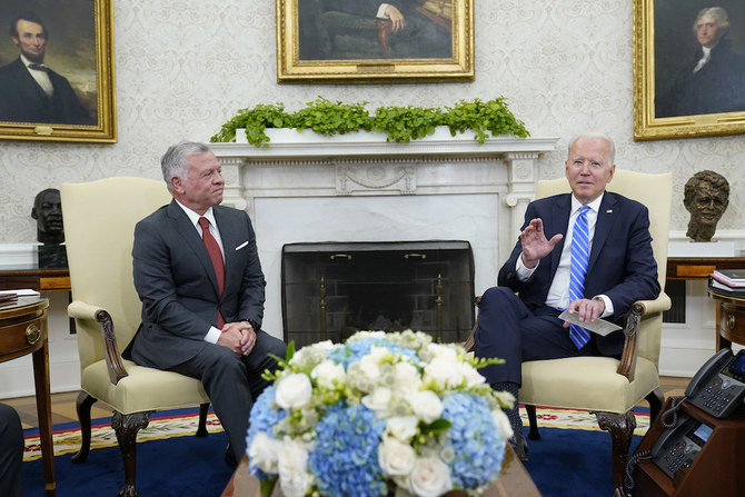US President Joe Biden (R) meets with Jordan’s King Abdullah II in the Oval Office of the White House in Washington, Monday, July 19, 2021. (AP)