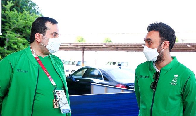 Saudi Arabian Olympic Committee President Prince Abdulaziz bin Turki Al-Faisal Al-Saud, right, landed in Tokyo on Tuesday to support the Kingdom’s athletes at the Olympic Games. (SAOC)