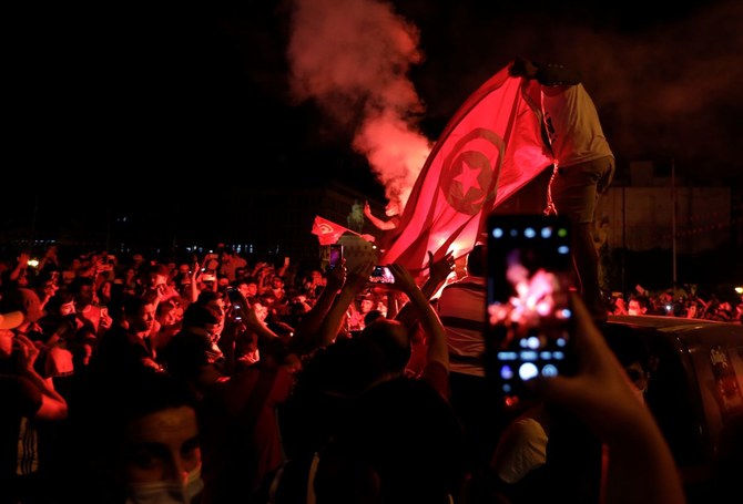 Tunisians celebrate government ousting with cheers, fireworks