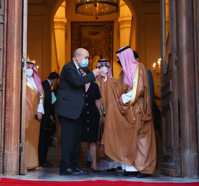 Saudi Arabia’s Foreign Minister Prince Faisal bin Farhan meets his French counterpart Jean-Yves Le Drian in Paris. (Twitter/@KSAMOFA)