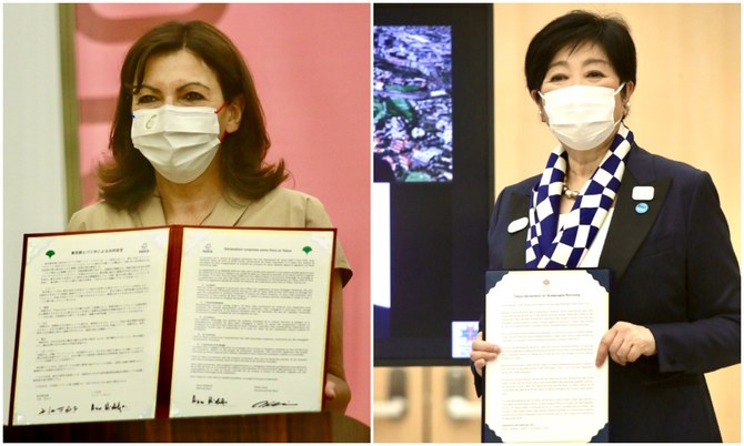 Tokyo Governor Yuriko Koike (R) and Paris Mayor Anne Hidalgo (L) during the ReStart event, where they signed a joint statement concerning sustainable issues and the Olympic Games. (ANJP Photos/ Pierre Boutier)