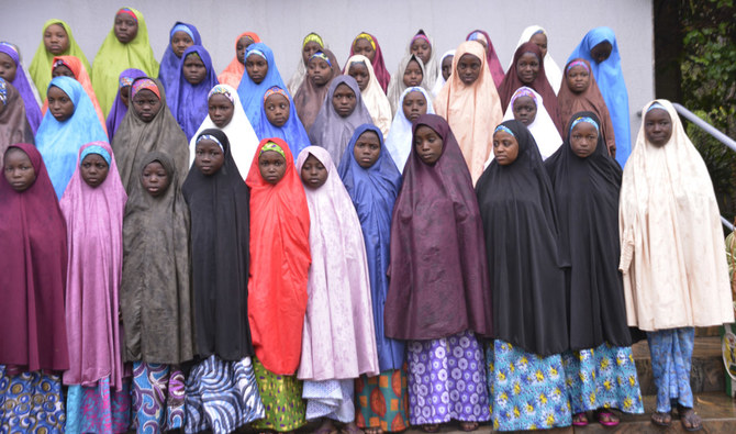  In this Friday March 23, 2018 file photo, recently released abduction victims, School girls from the Government Girls Science and Technical College Dapchi, pose for a photograph in Abuja, Nigeria. (AP)