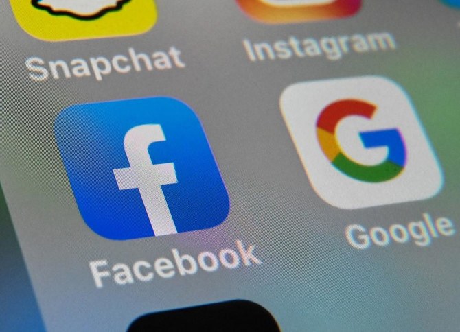 While most of Australia’s main media firms have signed deals, some smaller outlets say the law has not stopped their content generating clicks and advertising revenue for Facebook without compensation. (File/AFP)