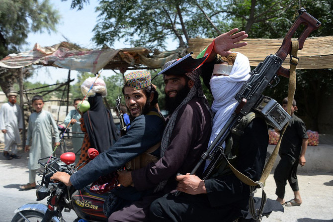 Afghan Taliban militants celebrate ceasefire on the second day of Eid in the outskirts of Jalalabad on June 16, 2018. (AFP)