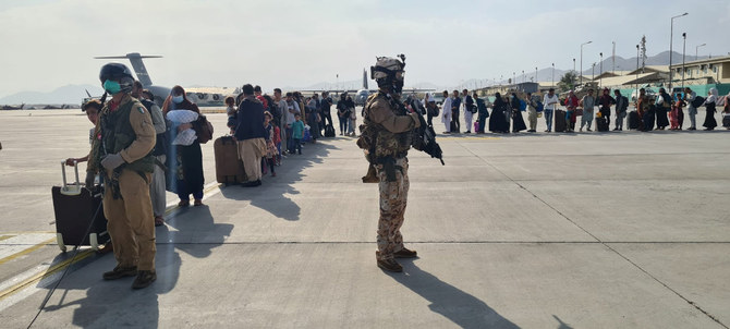 7 more dead in Kabul airport mayhem as thousands try to flee Afghanistan