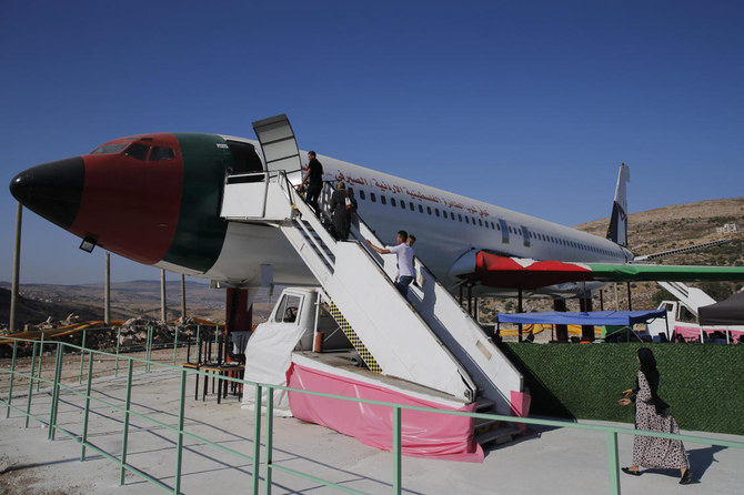 Palestinian twins open cafe in converted jet in West Bank