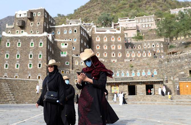 Tourists visit the cultural village of Rijal Almaa in the outskirts of Abha, Saudi Arabia. (REUTERS file photo)
