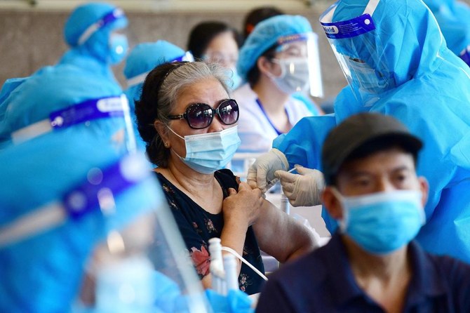 Vietnam’s biggest city to keep coronavirus curbs, flight resumption sought