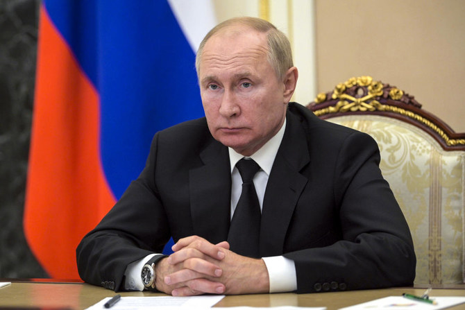 Russia&#39;s Vladimir Putin to self-isolate due to COVID-19 cases among inner  circle | Arab News