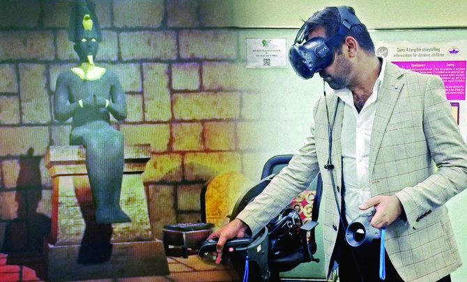Dr. Ali Jawaid tests a program and equipment for VR-based therapy for dementia patients during a study at Lahore University of Management Sciences. (Supplied)