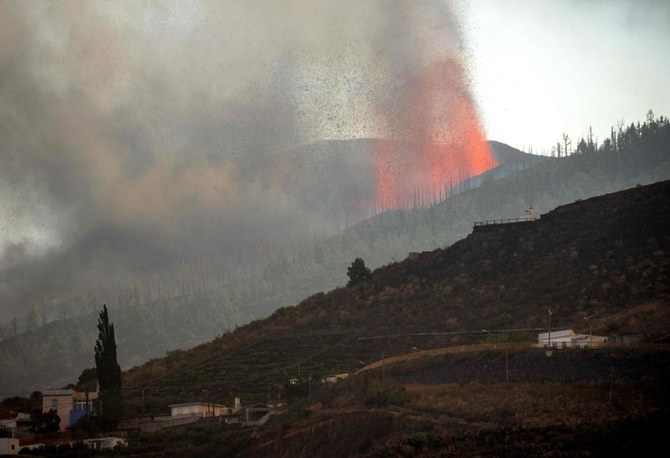 Canary islanders flee as volcano vents its fury