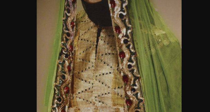 One of Princess Nourah's famous dresses, decorated with a circular geometric shape and filled with colored sequins. (Supplied/“Nourah bint Abdulrahman bin Faisal bin Turki Al-Saud an Illustrated Biography”)