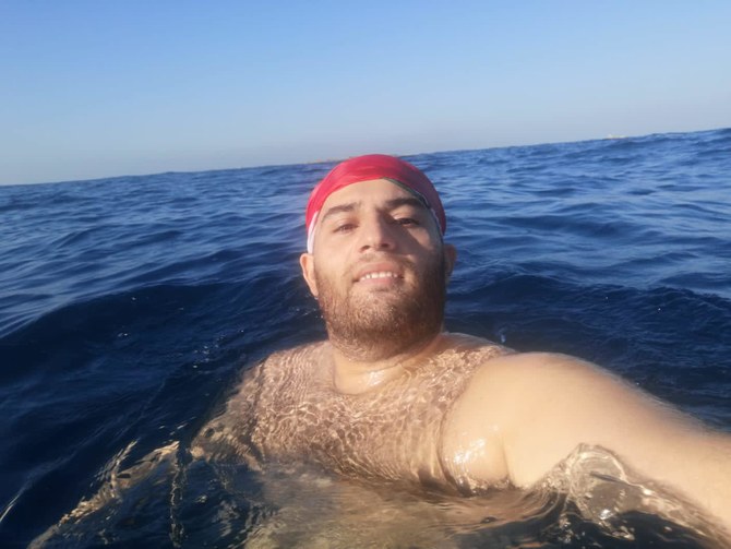 Lebanese teacher swims 5.5 km to island off Tripoli coast to challenge obesity bullies