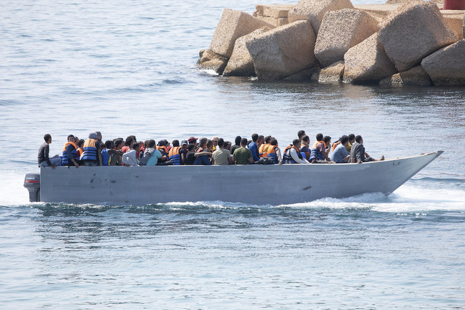 As migrant shipwreck survivors remember dead, hundreds more die this year trying to reach Italy