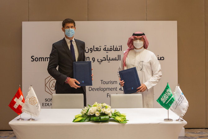 Benoît-Etienne Domenget, CEO of Sommet Education and Qusai Al-Fakhri, CEO of Tourism Development Fund at the partnership agreement ceremony. (Sommet Education)