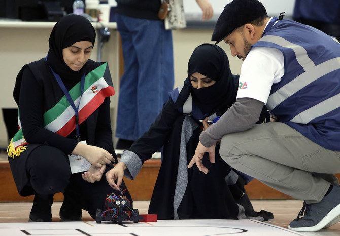 Students operate their robots as they participate in the 12th Arab Robotic Championship in Kuwait City on January 9, 2019. (AFP/File Photo)