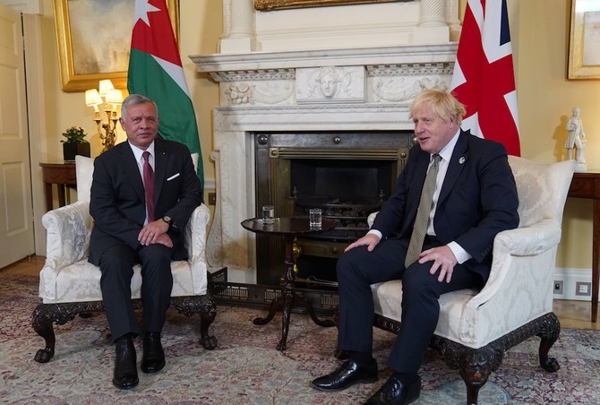 Jordan’s King Abdullah II meets with British Prime Minister Boris Johnson in London on Thursday, Oct. 28, 2021. (Petra)