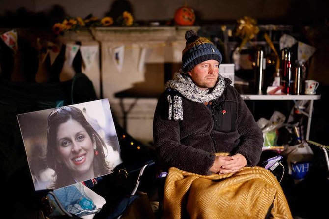 Richard Ratcliffe, husband of Nazanin Zaghari-Ratcliffe, a British-Iranian held in Iran since 2016, sits outside the Foreign Office in London on November 5, 2021. (AFP)