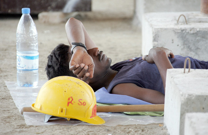 A  construction worker rests in the shade during the midday break at a construction site in Dubai. (AFP/File Photo)