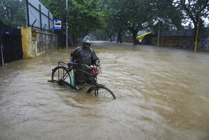 Heavy rains in southern India kill 14 people, flood Chennai