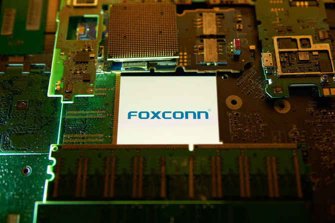 Global computer chip shortage to run into the second half of 2022, warns Apple supplier Foxconn 