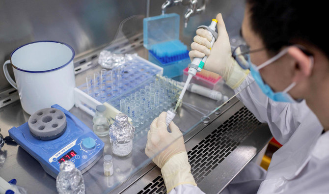 This file photo taken on April 29, 2020 shows an engineer working at the Quality Control Laboratory on an experimental vaccine for the COVID-19 coronavirus at the Sinovac Biotech facilities in Beijing. (AFP)